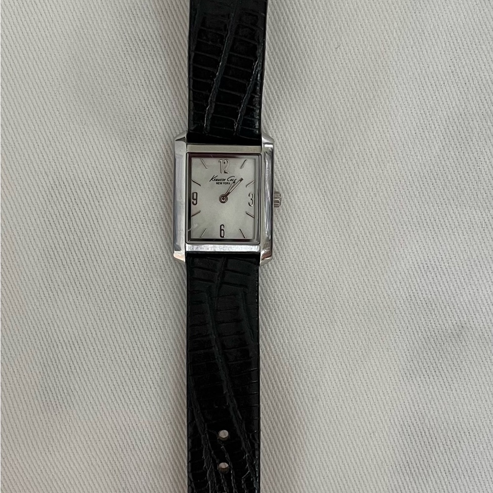Kenneth Cole silver watch with black leather strap